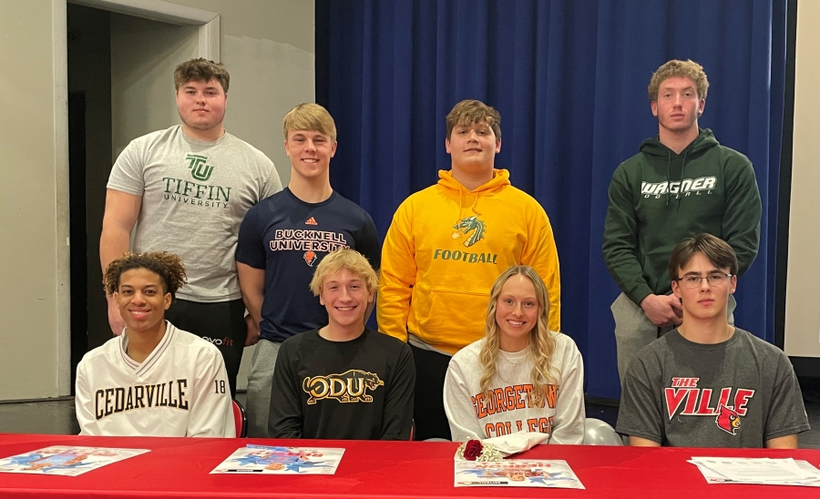 8 KHS Athletes Sign letters of intent to play college collegiately. Pictured Front Row L-R: Michael Braxton, Evan Reppeto, Ainsley Herron, and Jake Murphy.  Back Row L-R: Joseph Tungate, Nick Hoying, Cody Powell, and Jake Cameron.